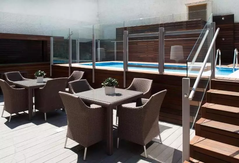 Отель Catalonia Mikado