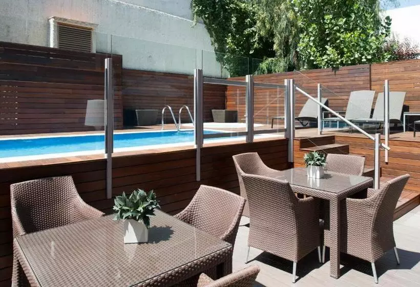 Отель Catalonia Mikado