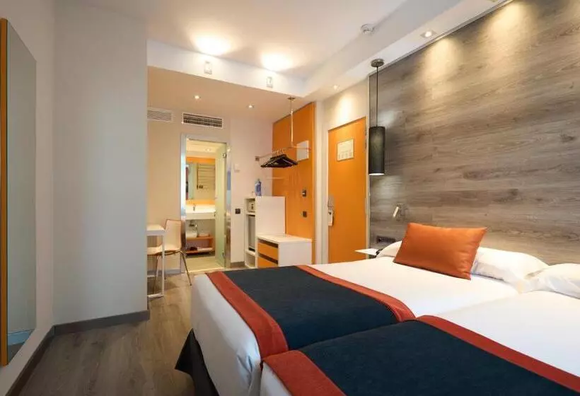 Отель Catalonia Mikado