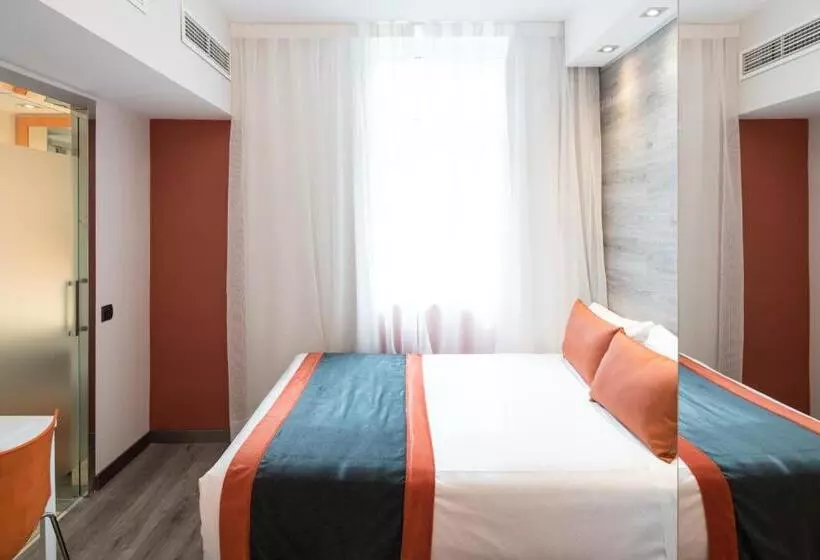 Отель Catalonia Mikado