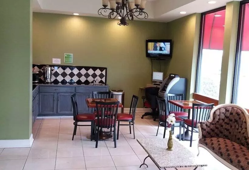 Отель Zainee Inc Budgetel Inn And Suites