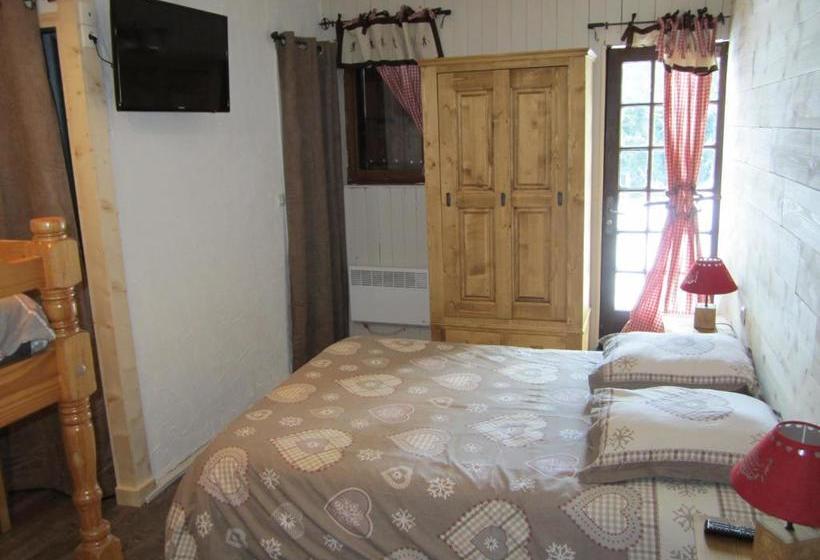 هتل Hôtel Chalet Le Caribou