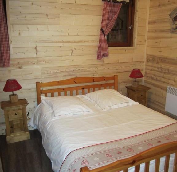 هتل Hôtel Chalet Le Caribou