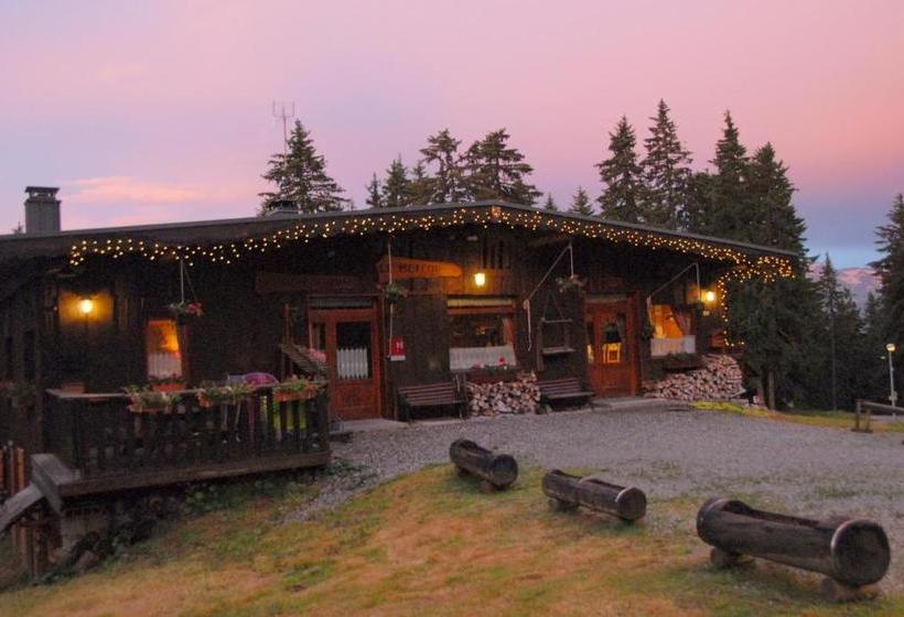 هتل Hôtel Chalet Le Caribou