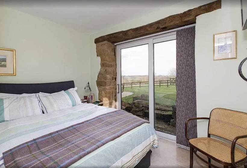 مبيت وإفطار Hillside Holiday Cottages