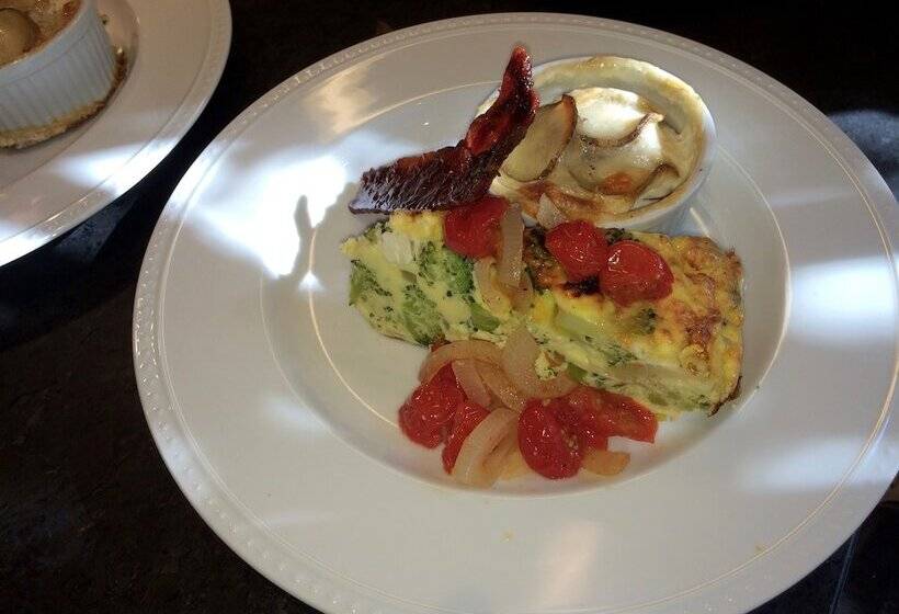 تختخواب و صبحانه Coach Stop Inn