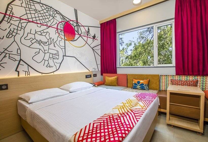 호텔 Ginger Sanand