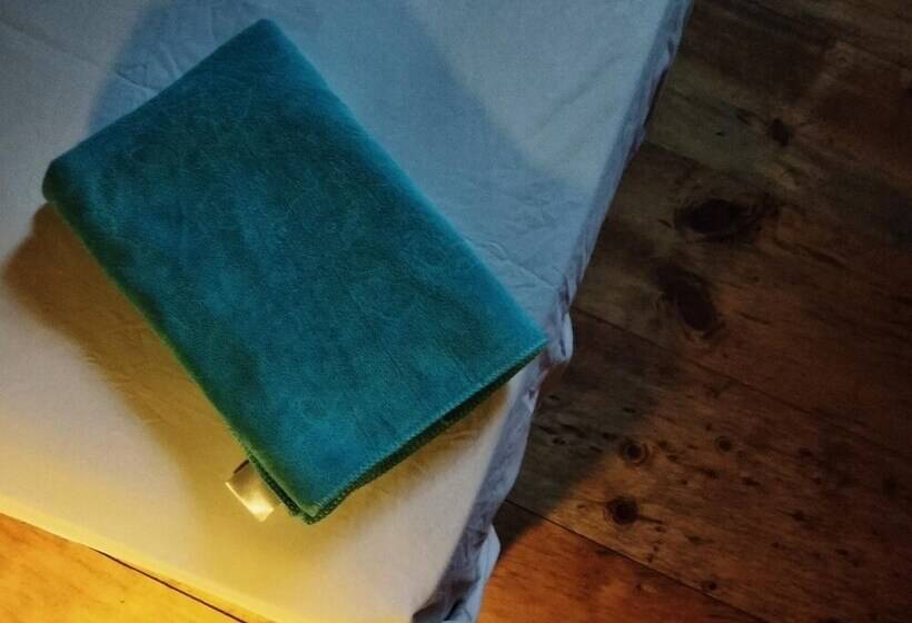 تختخواب و صبحانه Mama Tia Family Homestay