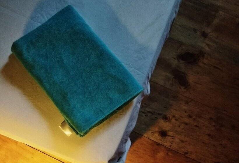 تختخواب و صبحانه Mama Tia Family Homestay