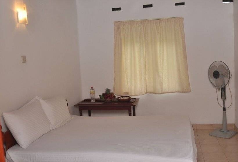 Pension (Hôtel basse catégorie) The Rock Bunglow