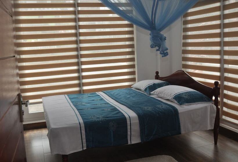 Pension (Hôtel basse catégorie) The Rock Bunglow