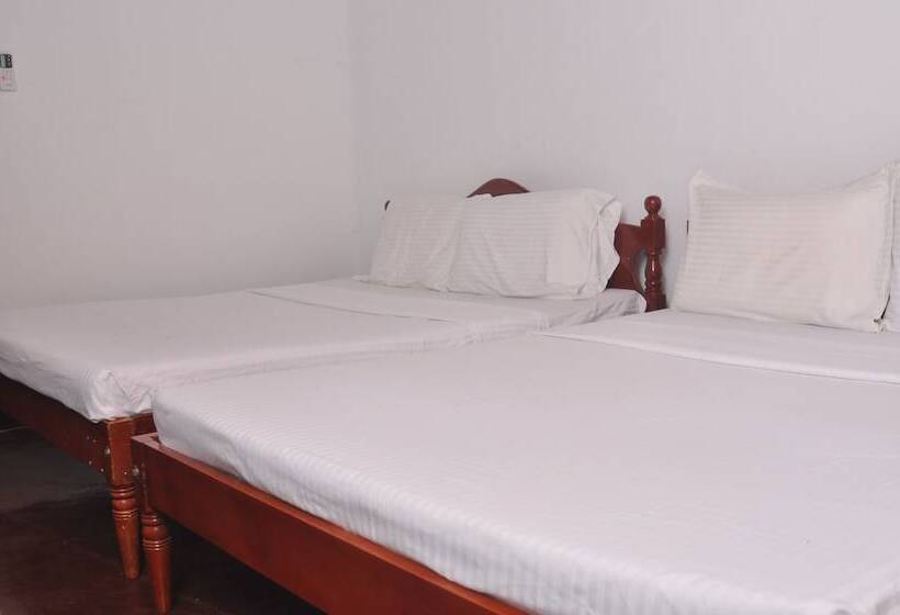 Pension (Hôtel basse catégorie) The Rock Bunglow