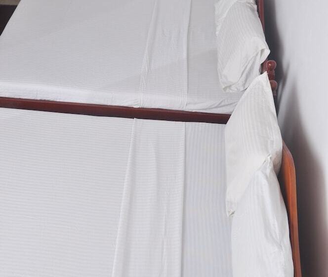 Pension (Hôtel basse catégorie) The Rock Bunglow