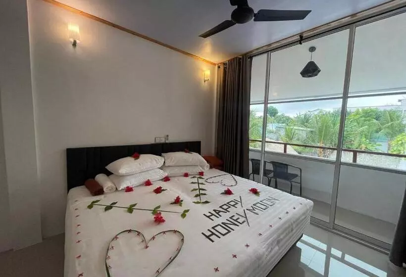 پانسیون Thoddoo White Sand Inn