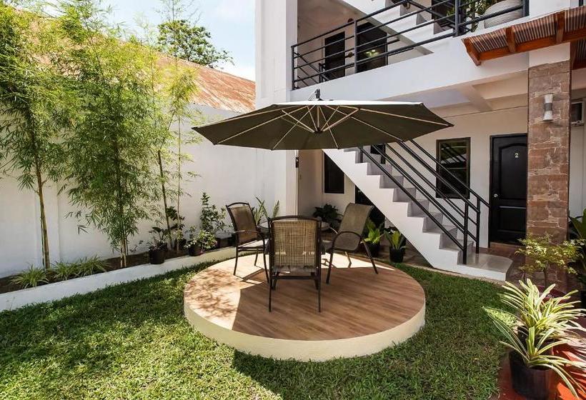 בית מלון כפרי Oyo 458 Kathy S Home Garden Suites