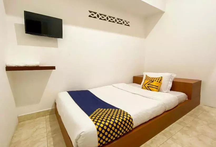 ホテル Spot On 2051 Sho Family Homestay And Resto