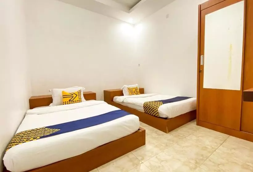 ホテル Spot On 2051 Sho Family Homestay And Resto