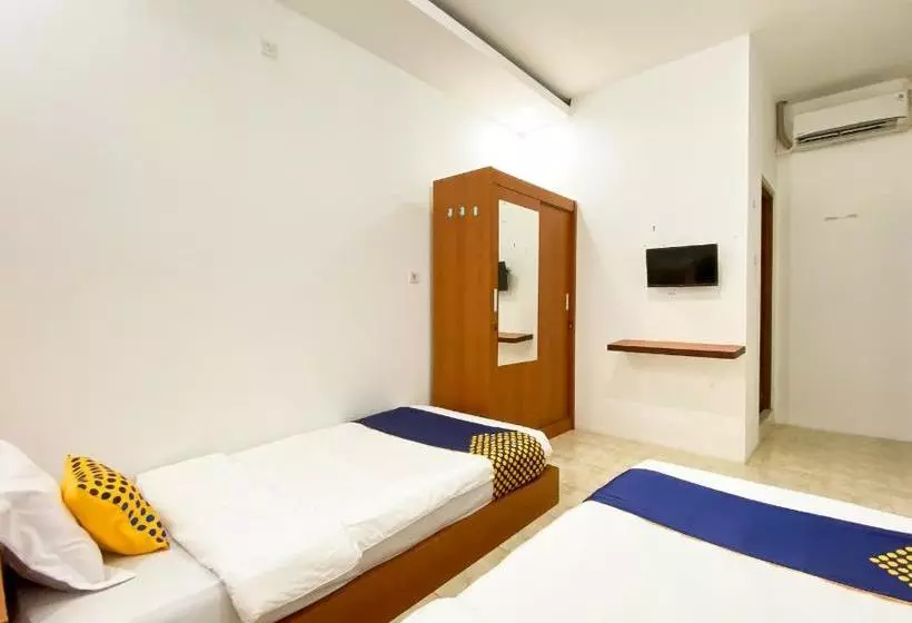 ホテル Spot On 2051 Sho Family Homestay And Resto