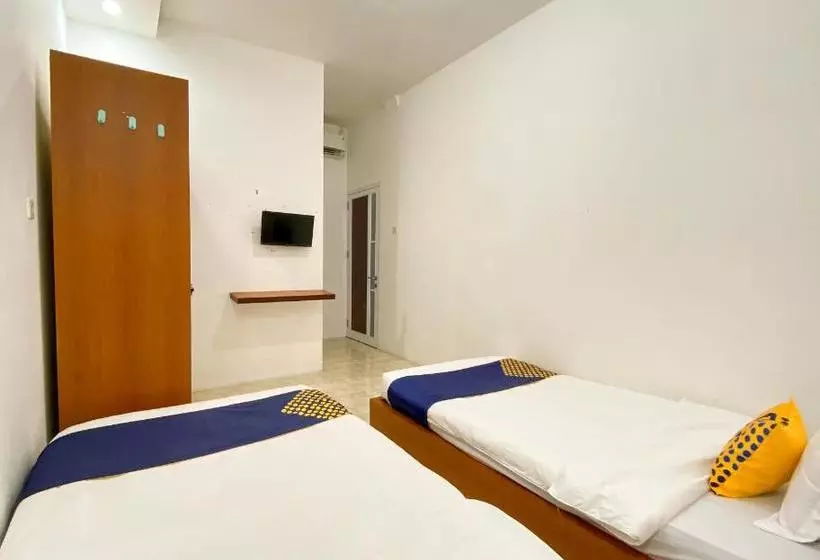 ホテル Spot On 2051 Sho Family Homestay And Resto