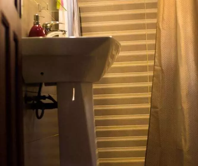 هتل Guesthouse Quatre Saisons