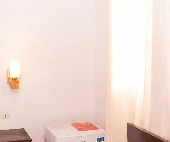 هتل Guesthouse Quatre Saisons