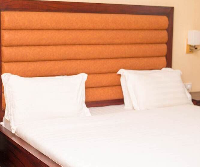 هتل Guesthouse Quatre Saisons