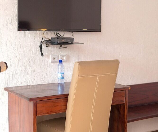 هتل Guesthouse Quatre Saisons