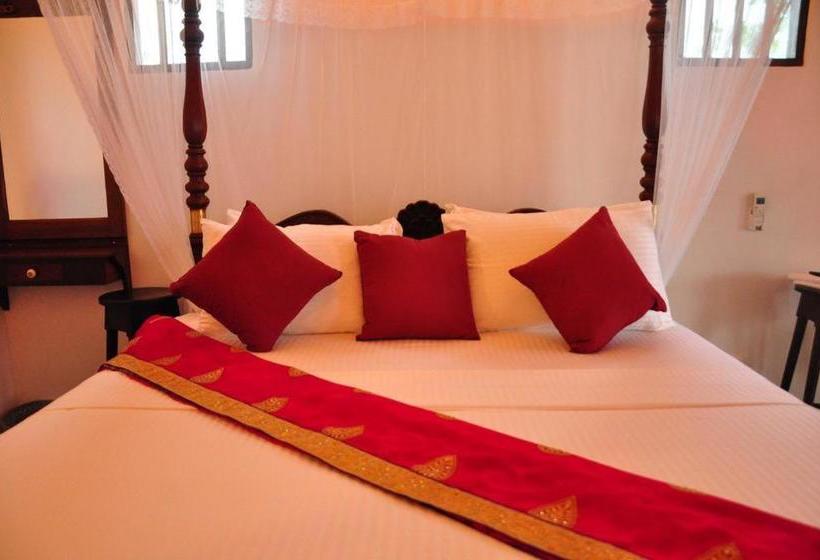 بنسيون Garland Beach Villa