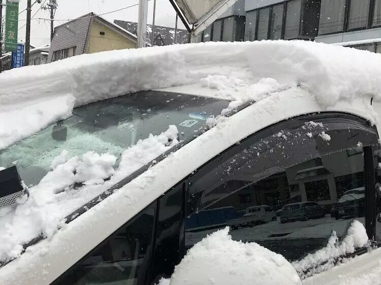 ペンション Snowhouse Memorie Hotel 石打丸山