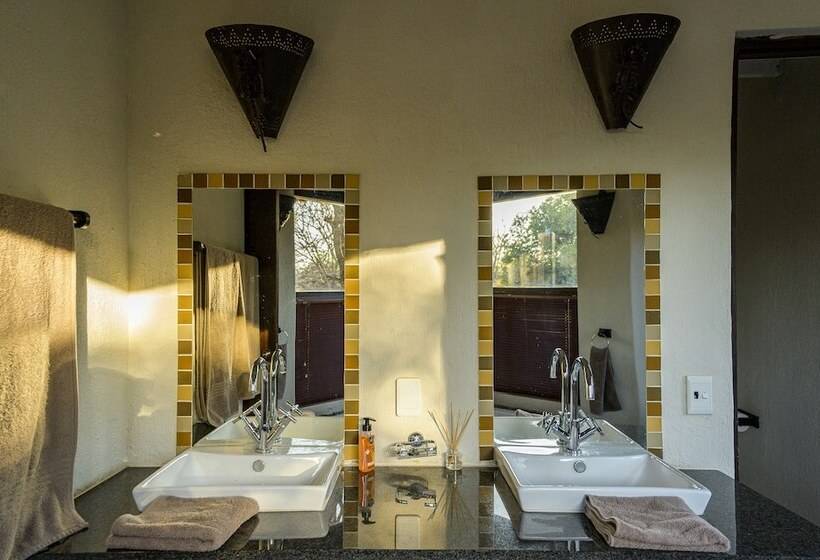 בית מלון כפרי Leopard's Lair Bush Lodge