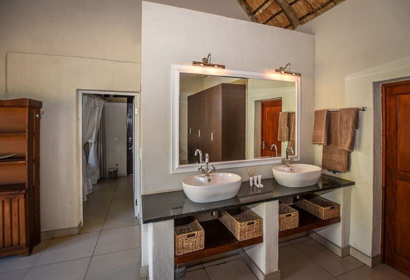 בית מלון כפרי Leopard's Lair Bush Lodge