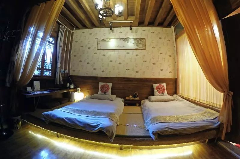 Hotelli Lijiang Lvyeanjia Inn