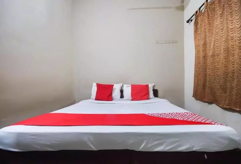 Hotelli Oyo 71275 Lingam S Lodge