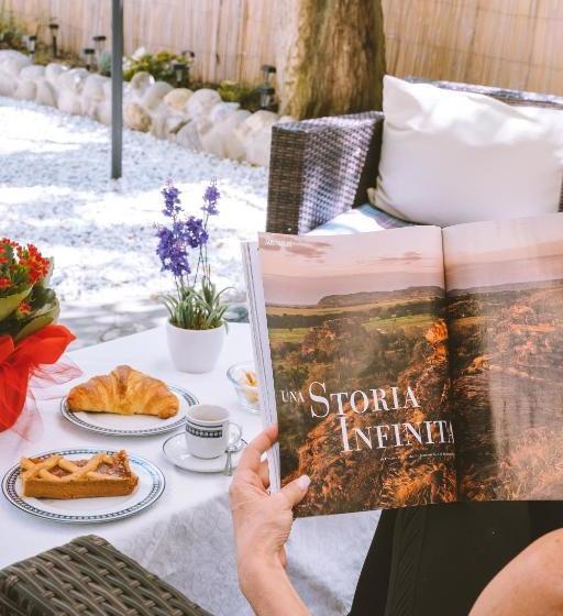 تختخواب و صبحانه La Petite Maison