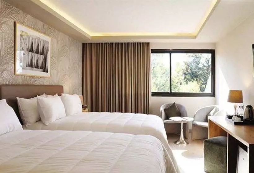 בית מלון כפרי Kenzi Rose Garden