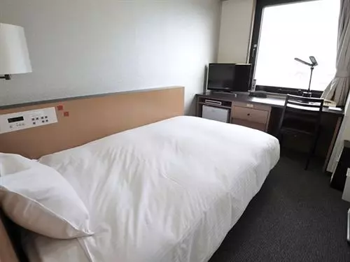 Отель Wing International Shinosaka