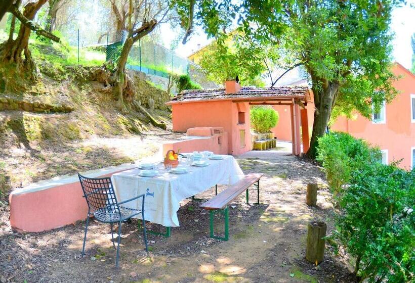 House Overlooking The Lake, In A Hilly Position