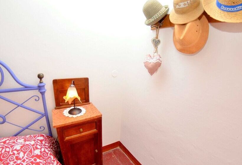 House Overlooking The Lake, In A Hilly Position