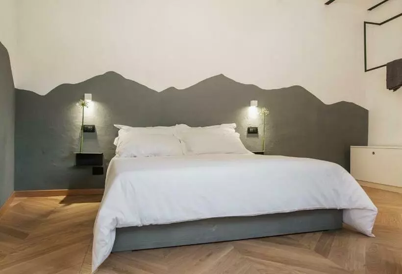 تختخواب و صبحانه Ognissanti Guesthouse & Suites
