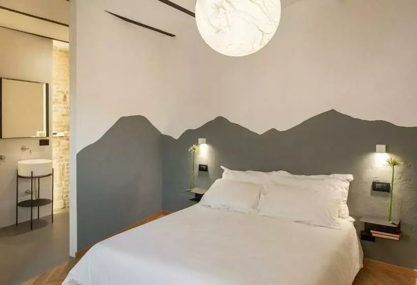 تختخواب و صبحانه Ognissanti Guesthouse & Suites