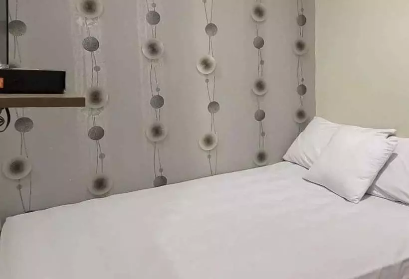 Hotelli Aimer Guest House Syariah Mitra Reddoorz