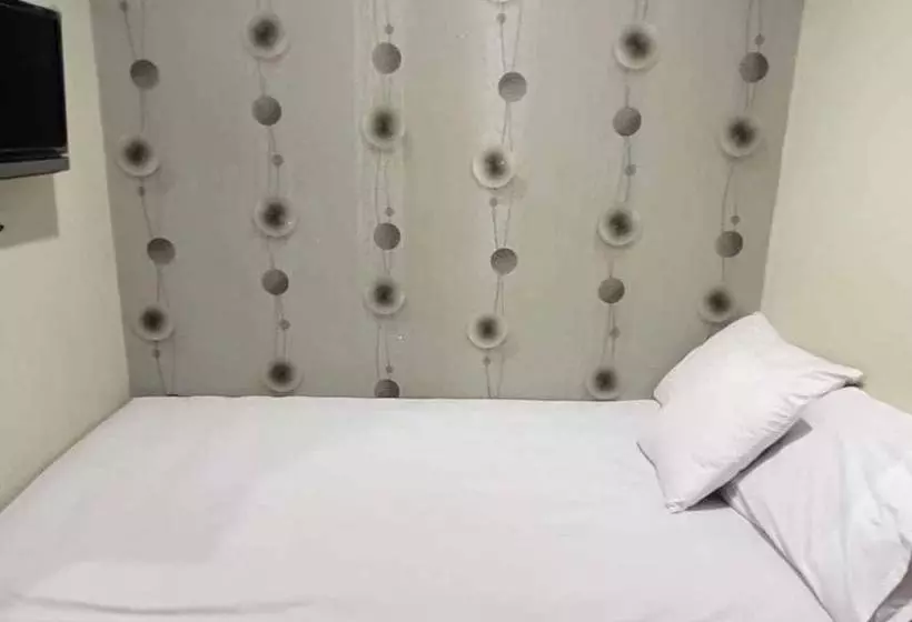 Hotelli Aimer Guest House Syariah Mitra Reddoorz