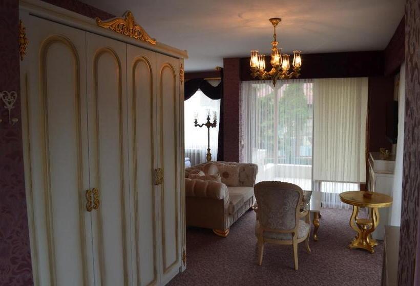 Отель Parla Viens Suites