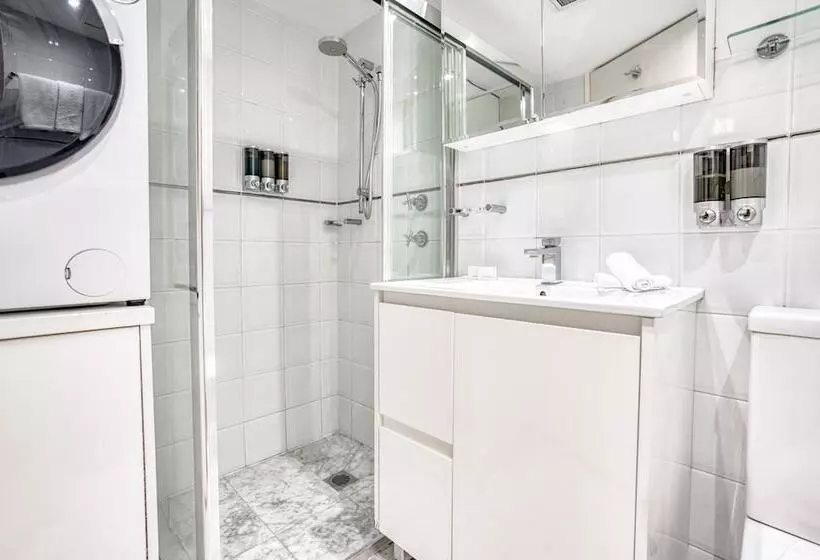 Отель Park Regis Concierge Apartments