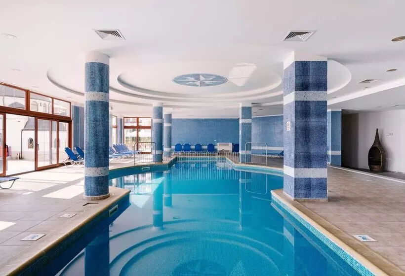 Отель Alua Helios Bay