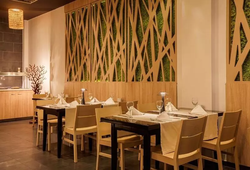 Отель Alua Helios Bay