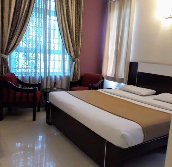 Отель Golden Larch Residency