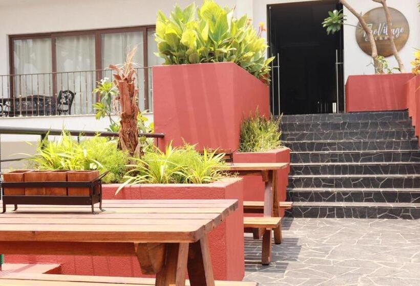 Hotell The Grand Village