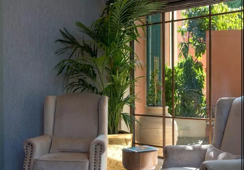 Отель Kefalari Suites