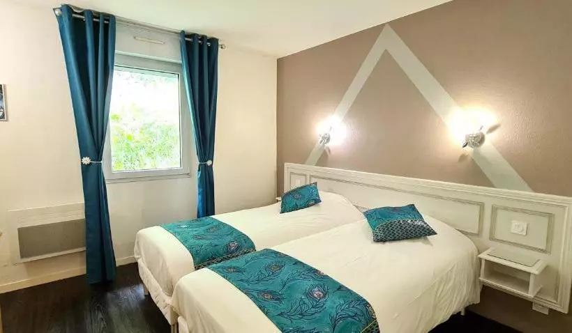 ホテル Fasthôtel Oloron Hostellerie Du Paon Blanc
